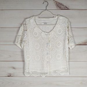 Nicole Marie M top Woman’s crocheted lined short sleeve button down front.